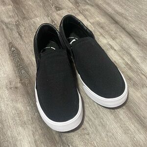 Brand new Nike Slip-ons